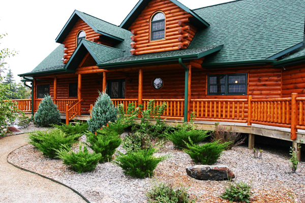 Дом из калиброванного бревна: особенности и преимущества